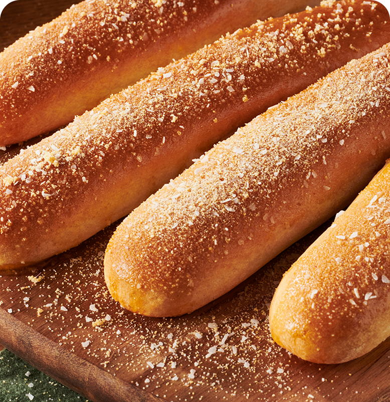 Warm garlic breadsticks