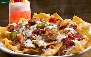 loaded pasta chips layered with italian cheeses meat sauce cherry peppers and alfredo - Olive Garden Pumpkin Cheesecake loaded pasta chips layered with italian cheeses meat sauce cherry peppers and alfredo - Olive Garden Pumpkin Cheesecake