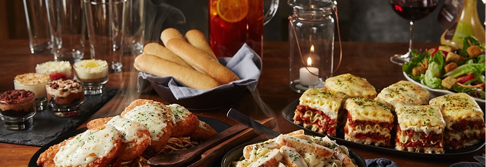 Olive Garden catering with delivery is a hit when you never have to miss a moment of the party